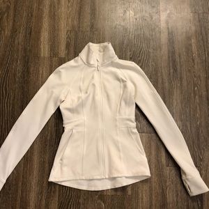 White Lululemon running/workout jacket.
